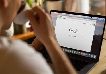 Laptop displaying Google search results for marketplace options.