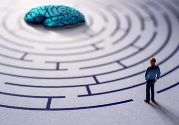 Mental Health Concept Miniature Figure Person on Maze