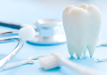 Dental model and dental equipment on blue background, concept image of dental background. dental hygiene background