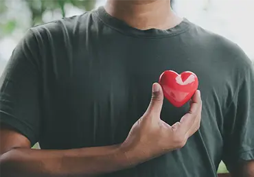 Hand holding red heart, World health day, Health care and mental health concept, Health insurance, Charity volunteer donation, CSR responsibility, World heart day, Self love