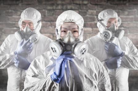 The HHS recently released all state testing plans for COVID-19. Three doctors suit up to administer coronavirus tests.