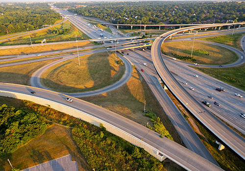 Morning traffic is photographed from an aerial view.