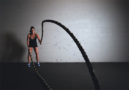 Woman chooses to exercise with a rope.