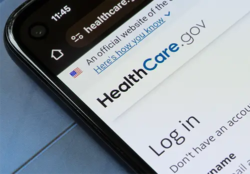 smartphone with the homepage of healthcare.gov