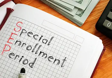 Special enrollment period SEP is shown on the conceptual business photo.